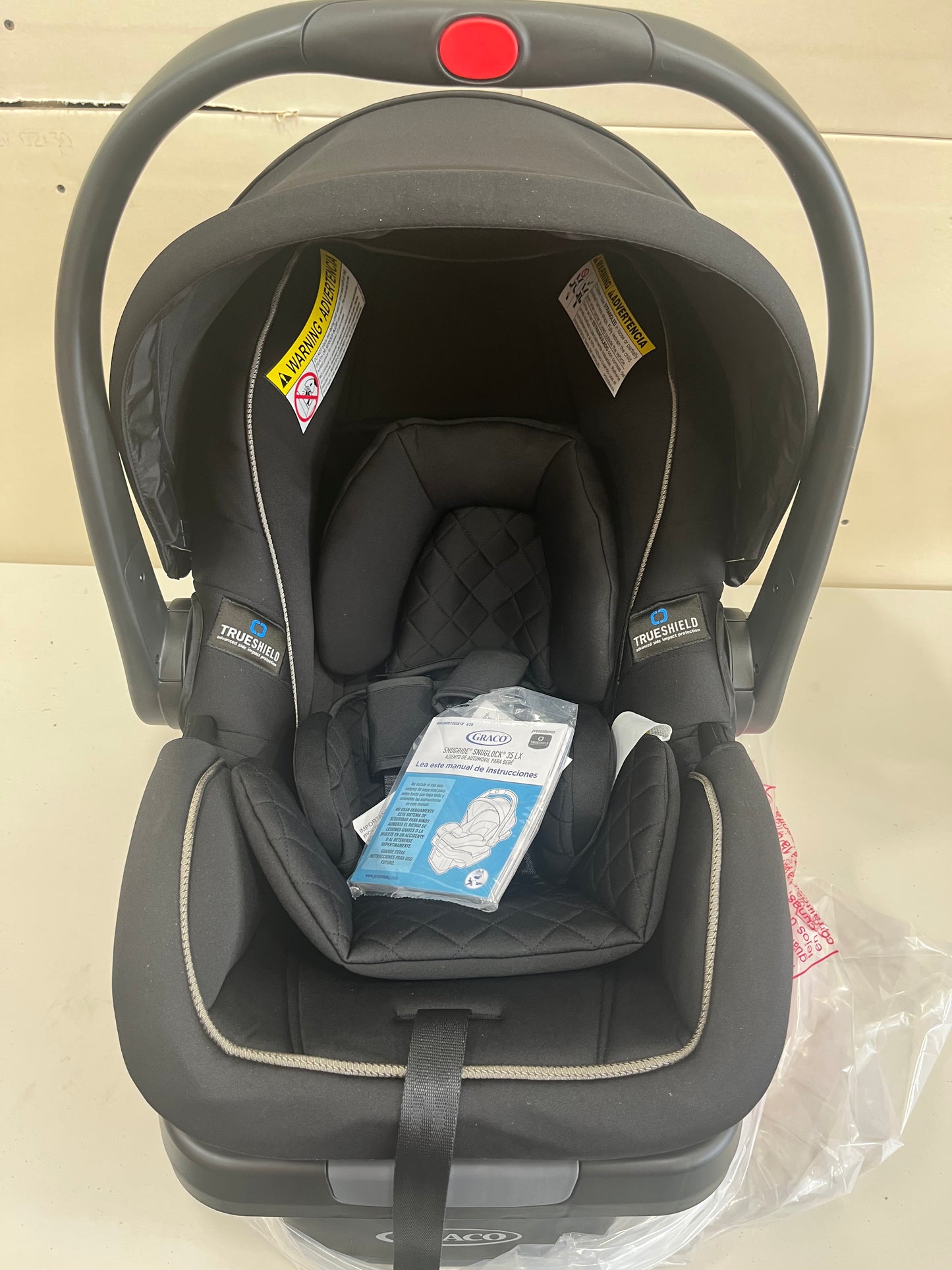 Graco SnugRide SnugLock LX Car Seat featuring TrueShield Technology, Ion