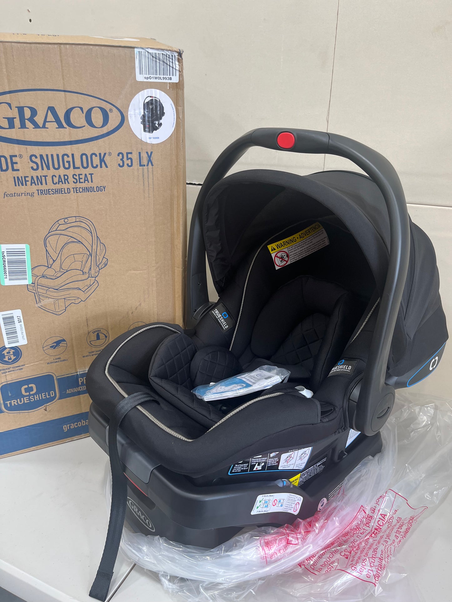 Graco SnugRide SnugLock LX Car Seat featuring TrueShield Technology, Ion